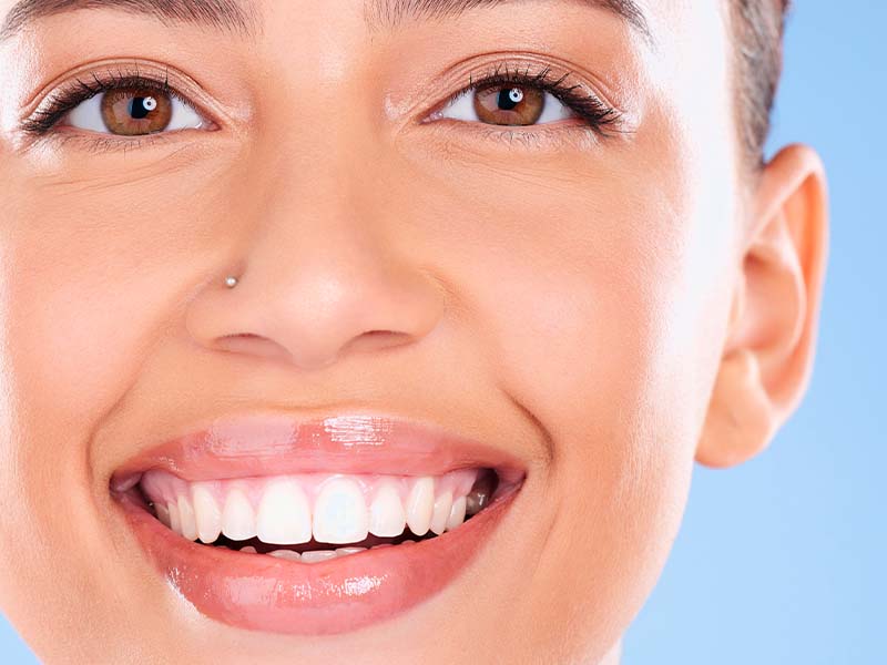 Adult patients smiling after general dentistry care in Cornwall