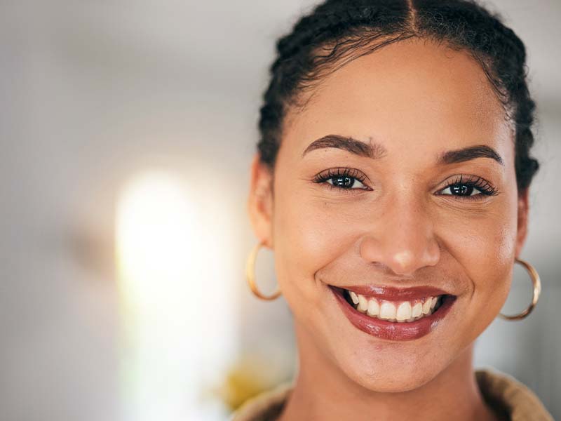 Adult smiles representing healthy gums after periodontal treatment